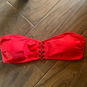 Strapless red bikini top.
